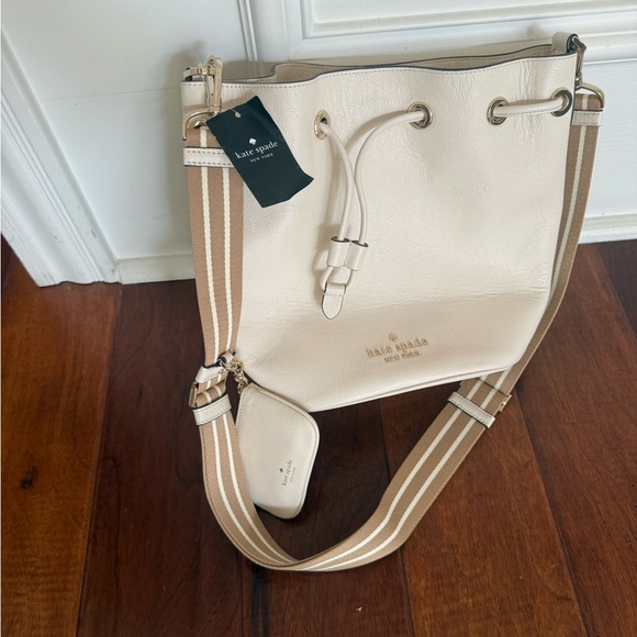 kate spade Handbags - Kate Spade Cream Shoulder Bag with Structured Design